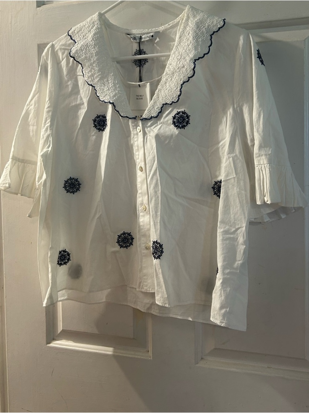 Zara White Blouse with Navy Embroidered Motifs